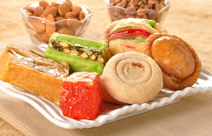 Assortment of Indian sweets and nuts