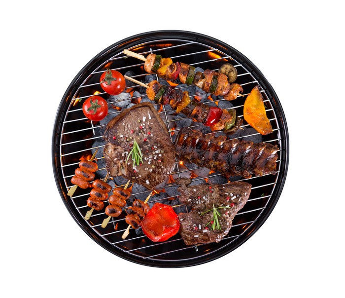 Barbecue grill with various meats and vegetables