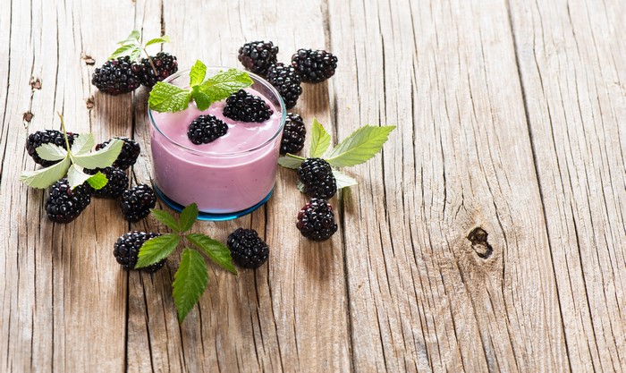 Blackberry Yogurt with Fresh Blackberries on Wood