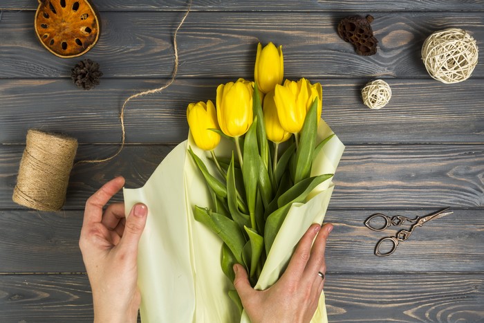 Yellow Tulips Bouquet Arrangement with Hands and Twine