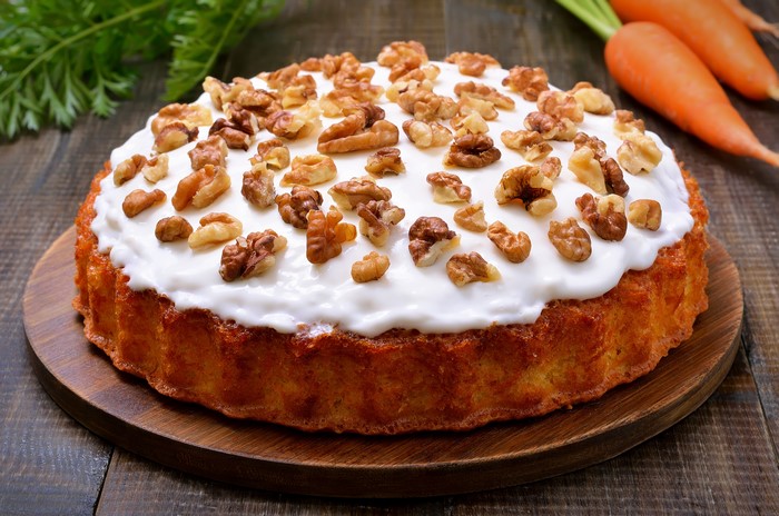 Carrot cake with walnuts and icing