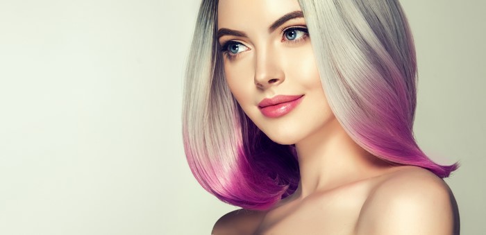 Woman with blonde and pink ombre hair