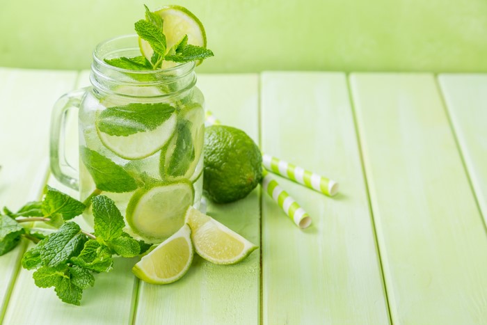Lime and mint infused water in a jar