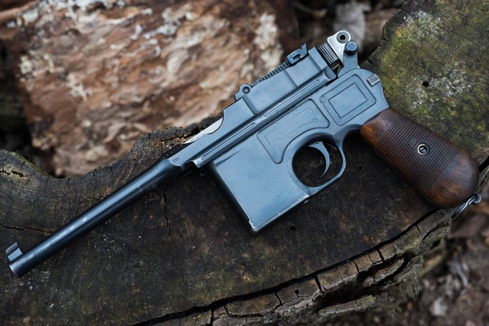 Mauser C96 pistol on wood