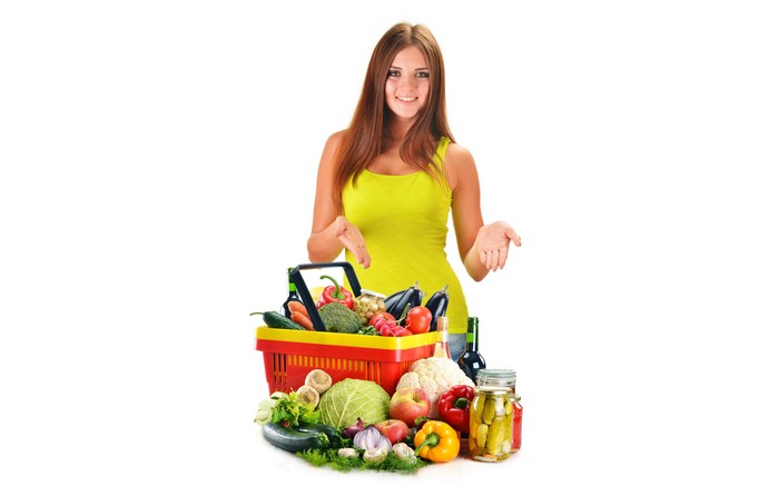 Woman with a basket of vegetables