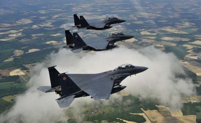 Three F-15E Strike Eagles from the 4th Fighter Wing flying in formation