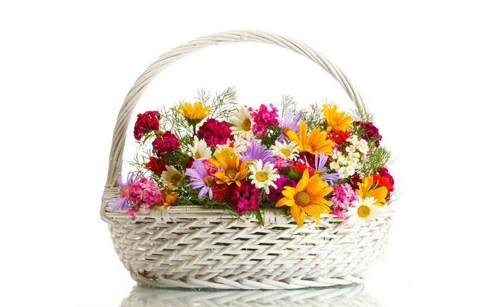 Wicker basket filled with colorful flowers