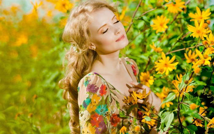 Blonde girl with flowers