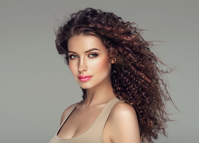 Beautiful woman with curly brown hair
