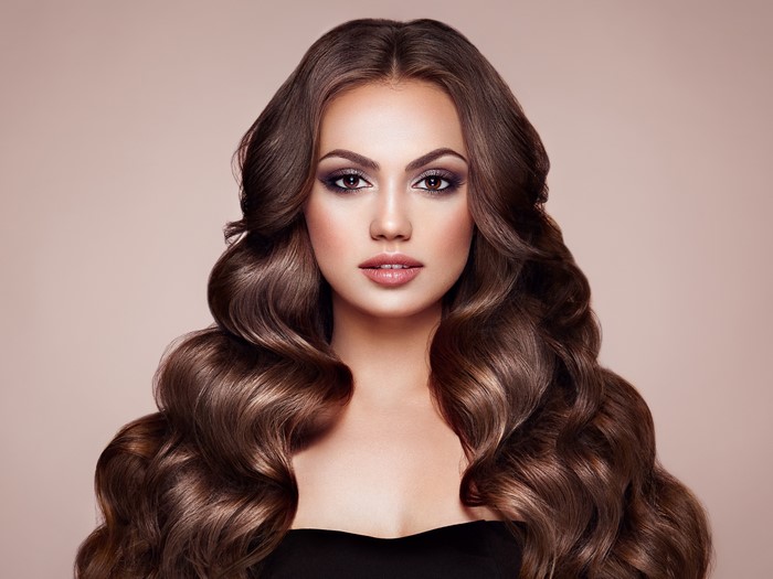 Brown Haired Woman with Wavy Hairstyle