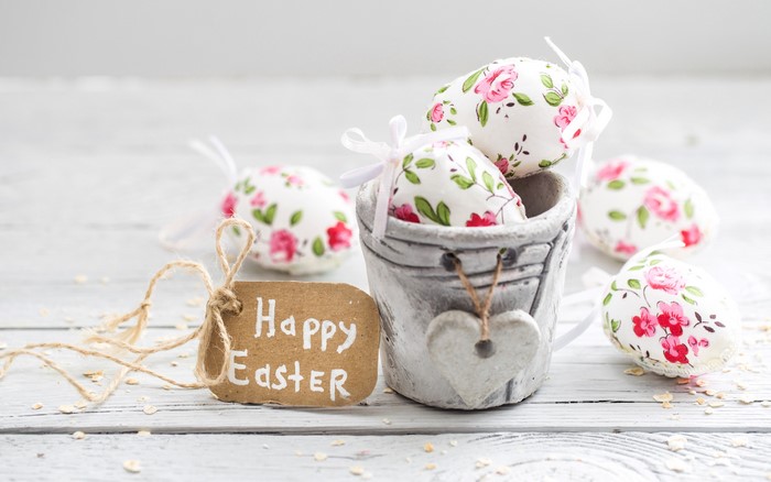 Easter eggs in a bucket with a Happy Easter tag