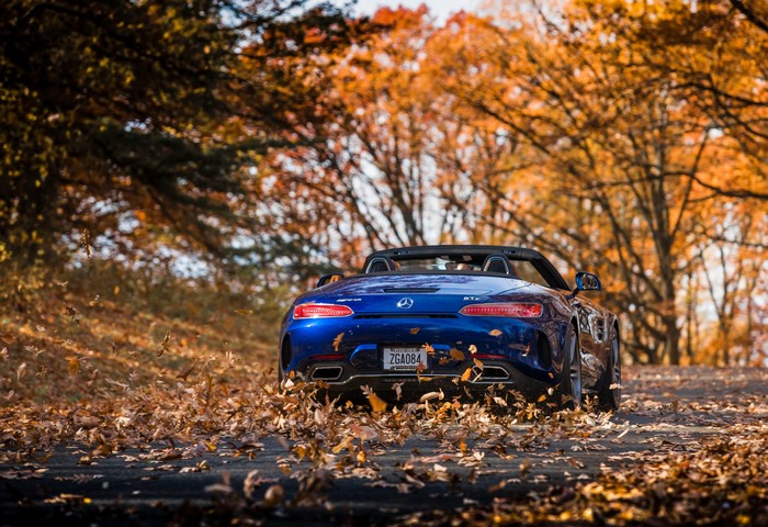 Blue Mercedes-Benz AMG GT C Roadster in Autumn Foliage