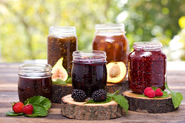 Jars of Jam with Fresh Berries and Fruit