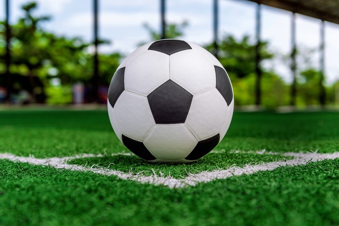 Soccer ball on a green field