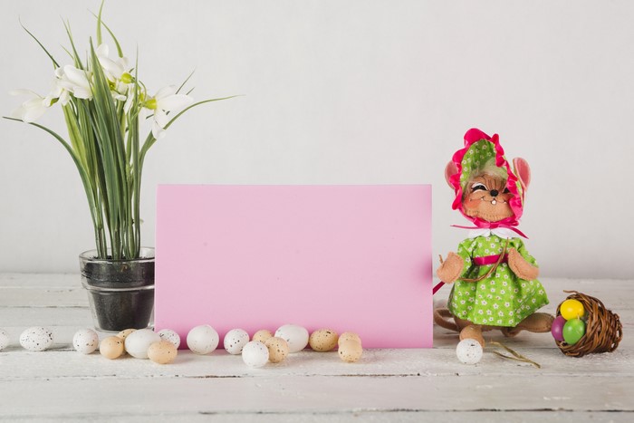 Easter greeting card with mouse and eggs