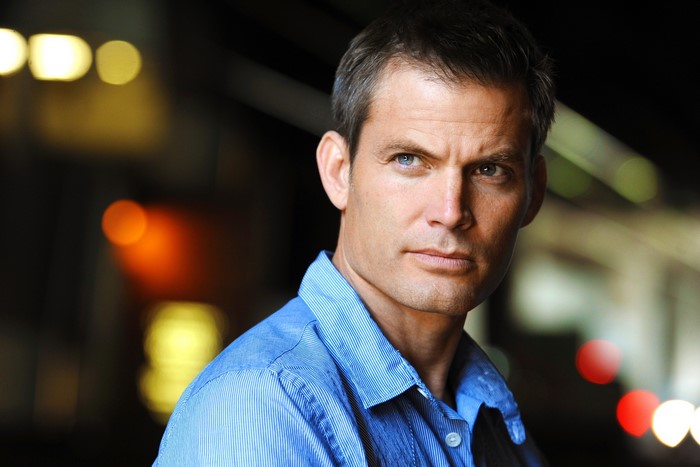Casper Van Dien in a blue shirt