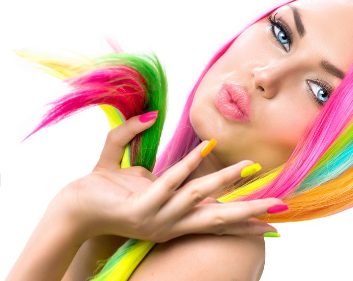 Woman with multicolor hair and bright nails