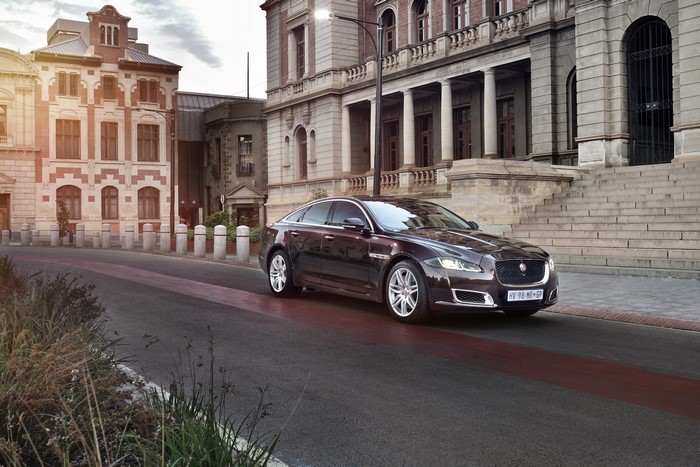 Jaguar XJ50 wine metallic sedan on street
