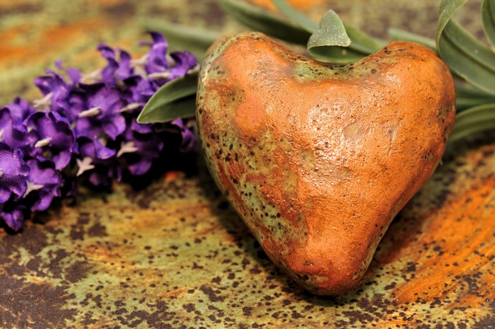 Heart stone with lavender and green leaves