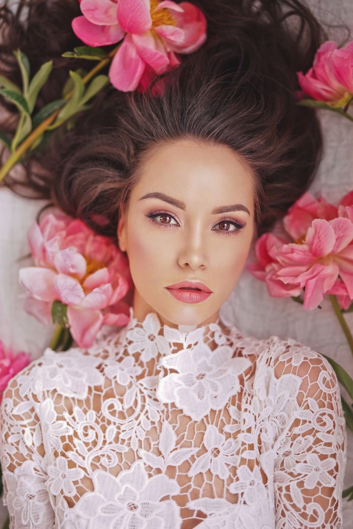 Beautiful Asian woman with peonies