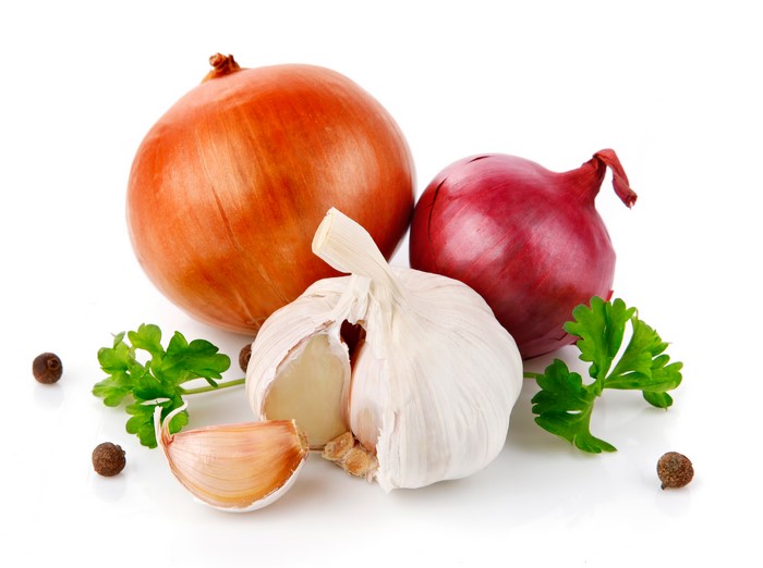 Onion, Garlic, Black Pepper, and Parsley on White Background