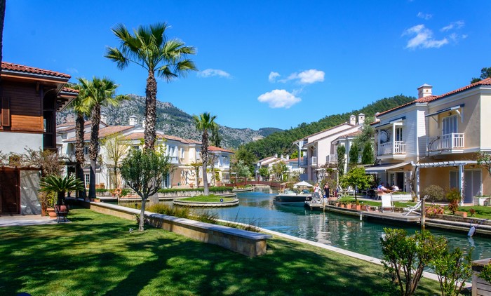 Canal houses with palm trees in Dalaman, Mugla, Turkey