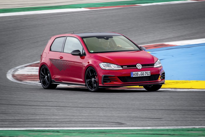 Red Volkswagen Golf GTI TCR on a race track