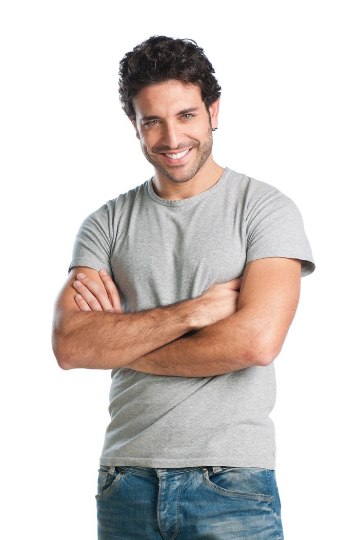 Man in gray t-shirt and jeans smiling