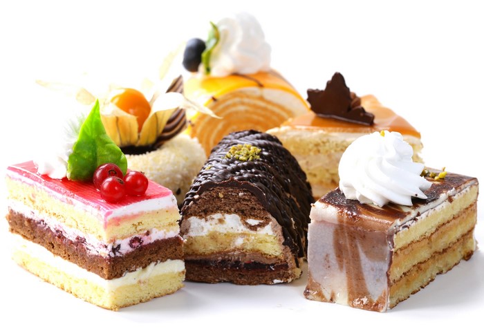 Assortment of decorated cakes and pastries