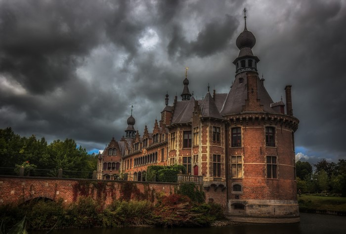 Ooidonk Castle with pond and bridge in Belgium