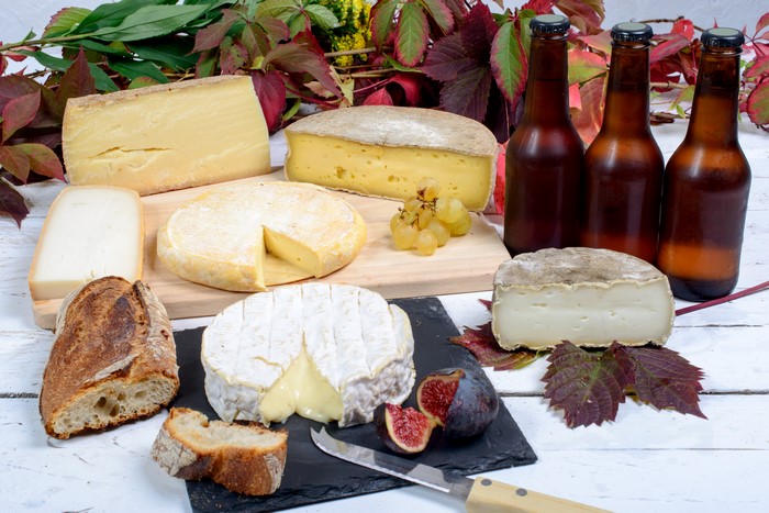 Cheese, Bread, Grapes, Figs, and Beer Bottles