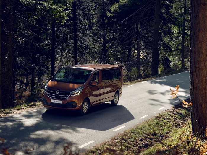 Renault Trafic Minibus driving on a forest road
