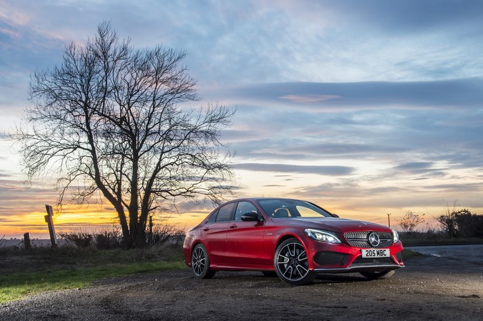 Red Mercedes-Benz C-Class W205 Sedan at Sunset