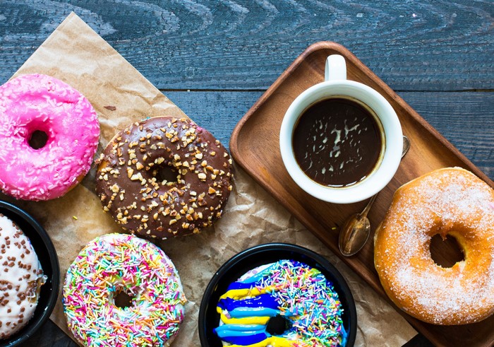 Donuts and Coffee on Wood Planks
