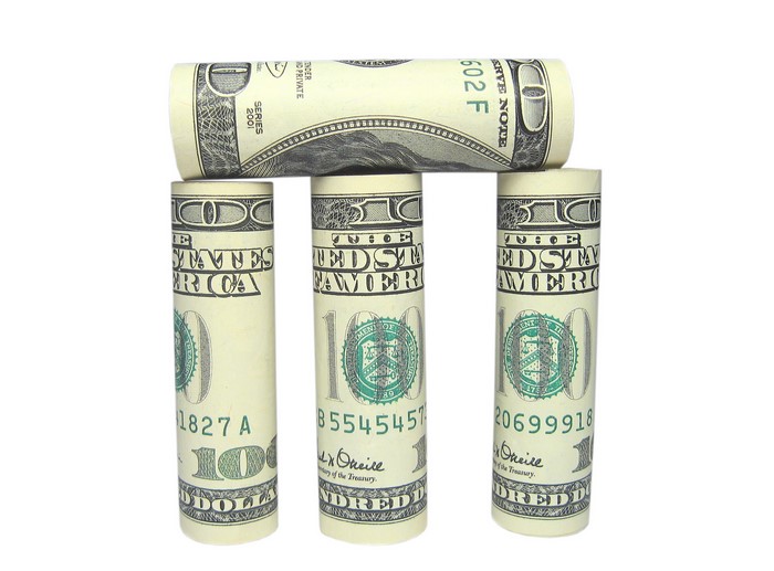 Rolled US Dollar Bills Arranged