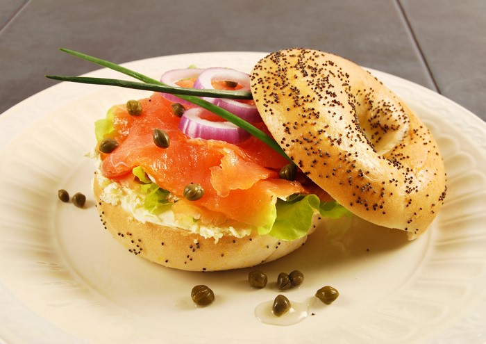 Poppy seed bagel with smoked salmon and cream cheese