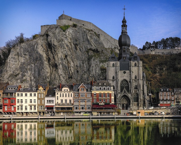 Church and Citadel overlooking the River Meuse in Dinant, Belgium