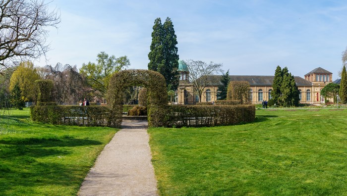 Botanischer Garten Karlsruhe, Germany, with manicured hedges and building