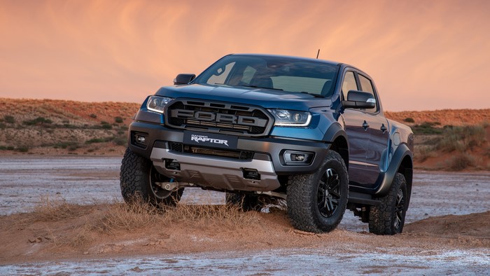 Ford Ranger Raptor pickup truck in desert landscape