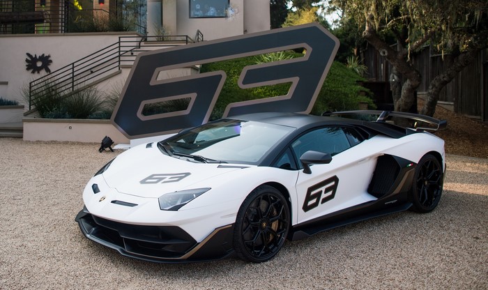 White Lamborghini Aventador SVJ with "63" graphics