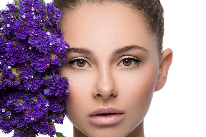 Woman's Face with Purple Flowers