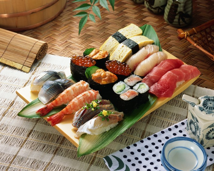 Assortment of sushi and sashimi on a platter