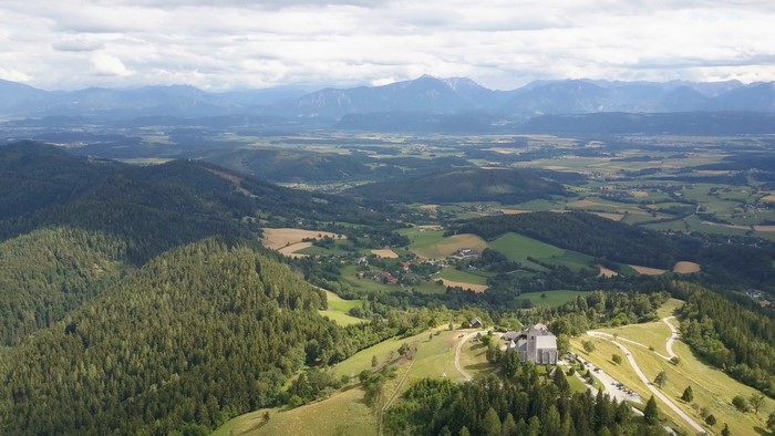 Magdalensberg, Austria from above with forests and houses