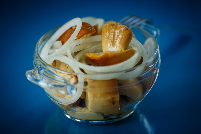 Mushrooms and onion in a bowl