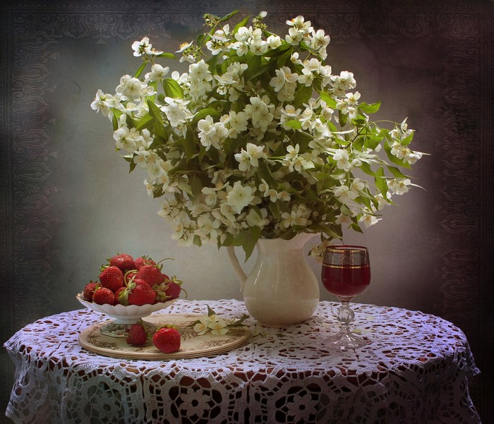 Still life with strawberries, jasmine, and wine
