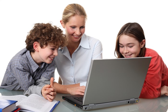 Mother and children using a laptop