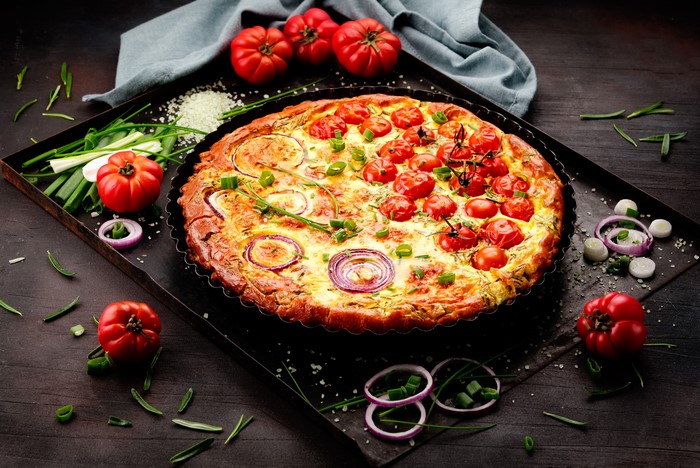 Delicious 4K Pizza with Fresh Tomatoes and Onion