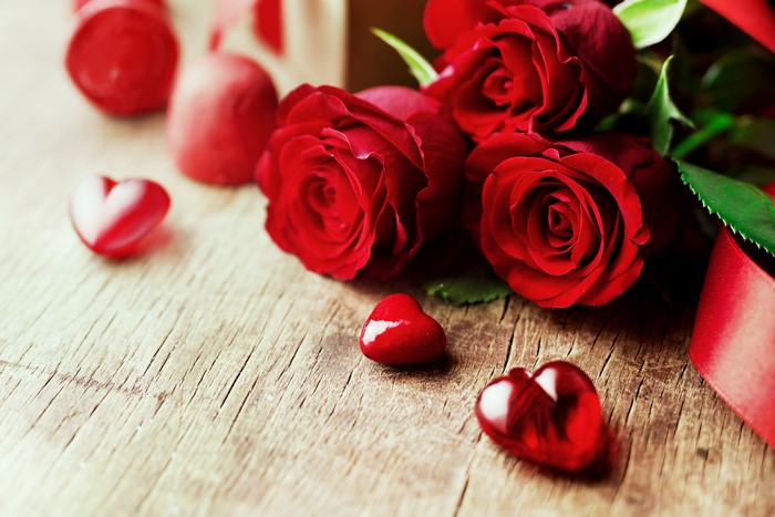 Red Roses and Hearts on Wooden Surface