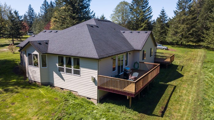 House with decks and trees
