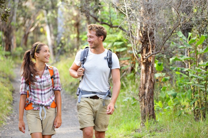 Couple hiking on a forest path